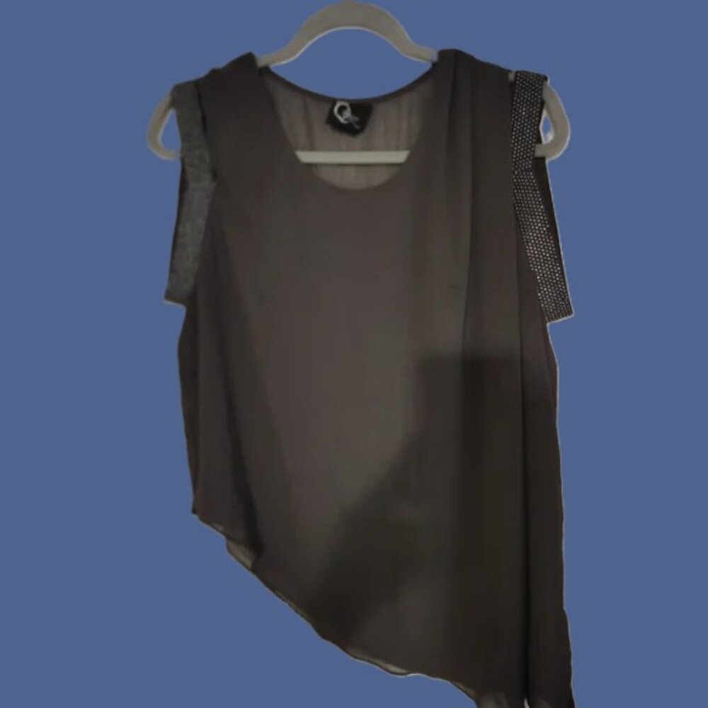 Black Cold Shoulder Asymmetrical top.  This Unique top is sleek and contemporary